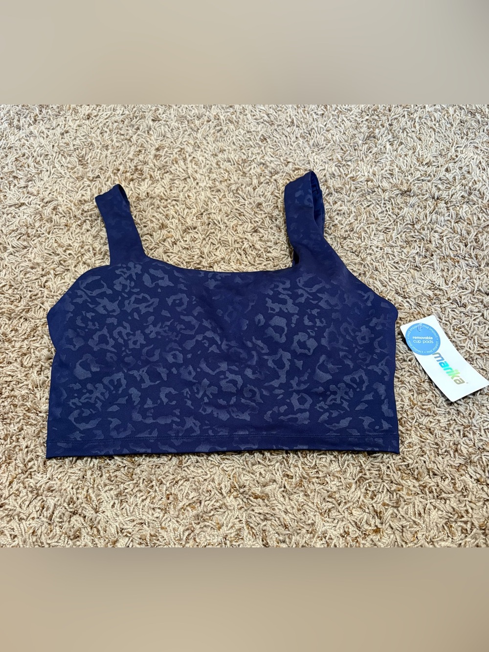 Marika "Lola" longline sports bra navy embossed animal print women’s size L NWT!
